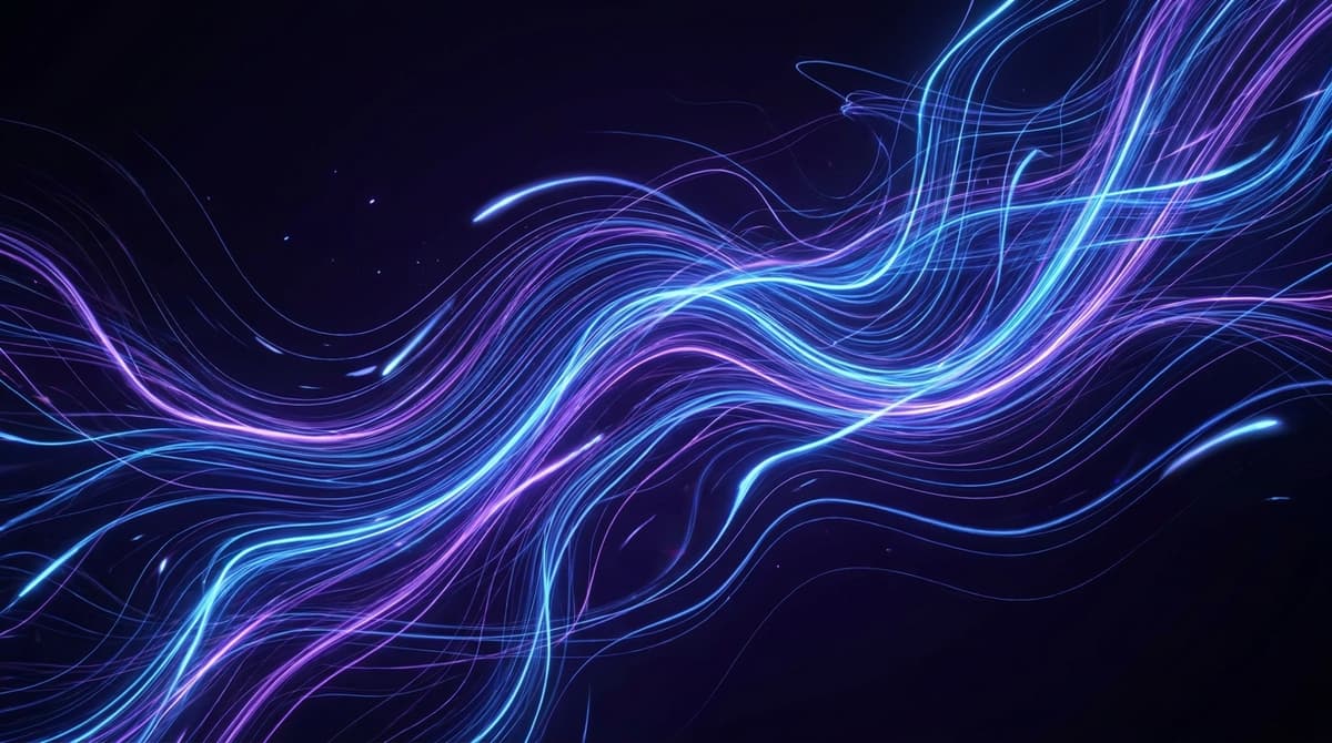 Bright glowing plasma particles in electric blue and purple tones swirling against a dark background